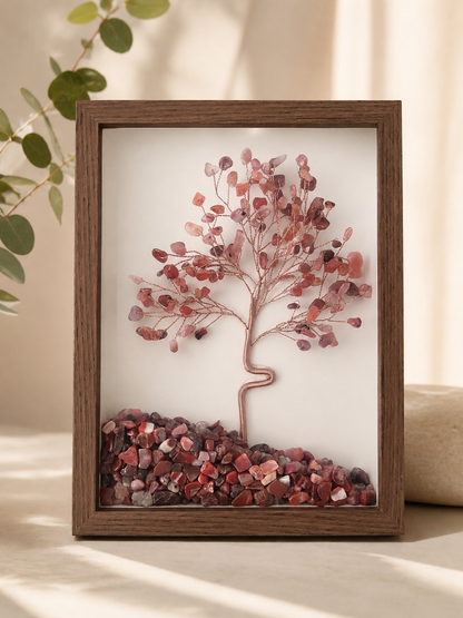 A framed natural crystal tree art piece in a brown wooden frame, Carnelian