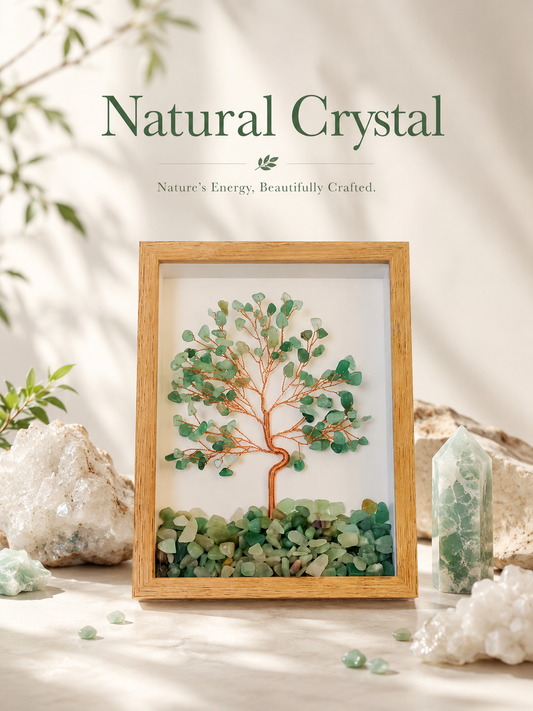 A framed natural crystal tree art piece in a brown wooden frame, green aventurine